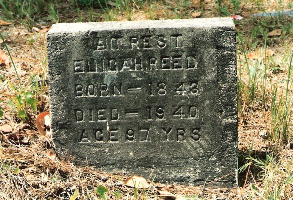 Headstone of Elijah Adkins Reed (1845–1940), first documented burial at New Pine Hill Cemetery, Claiborne Parish, Louisiana.